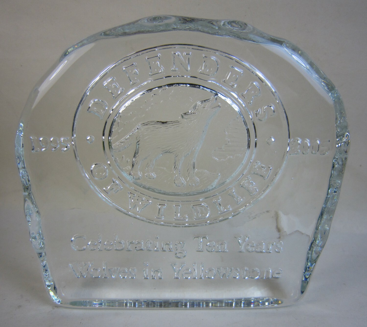 2005 Defenders of Wildlife 10 Years of Wolves in Yellowstone Glass Paperweight