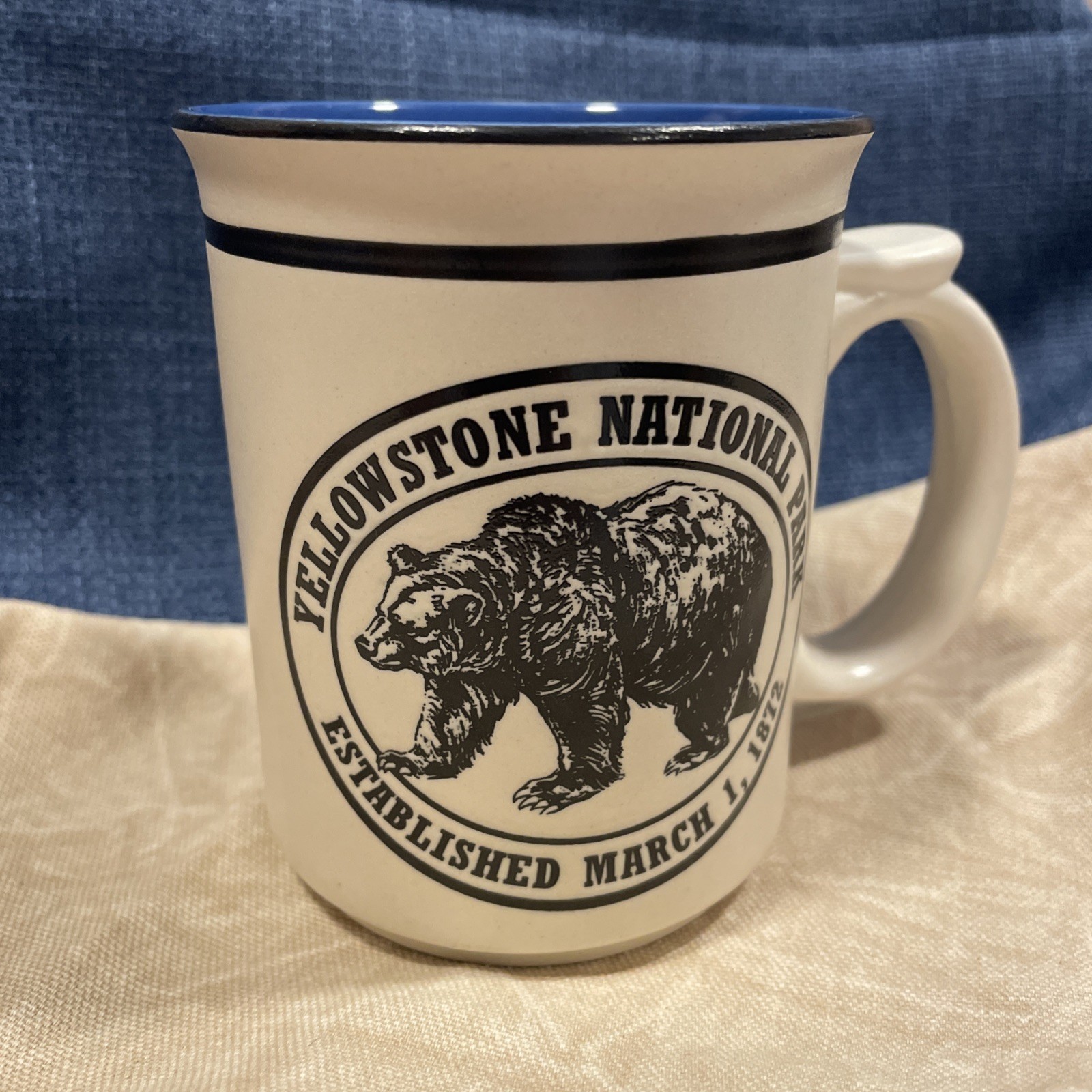 Grizzly Country Yellowstone National Park Mug Blue/black/cream Bear & Paw Print