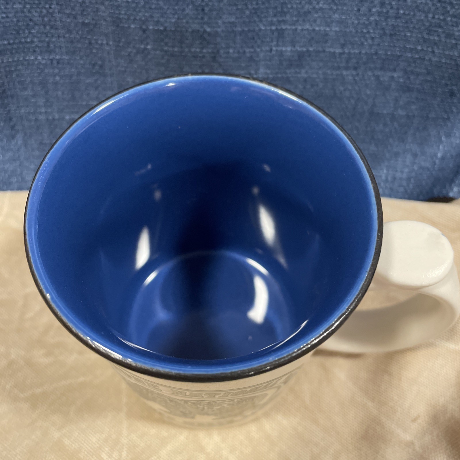 Grizzly Country Yellowstone National Park Mug Blue/black/cream Bear & Paw Print