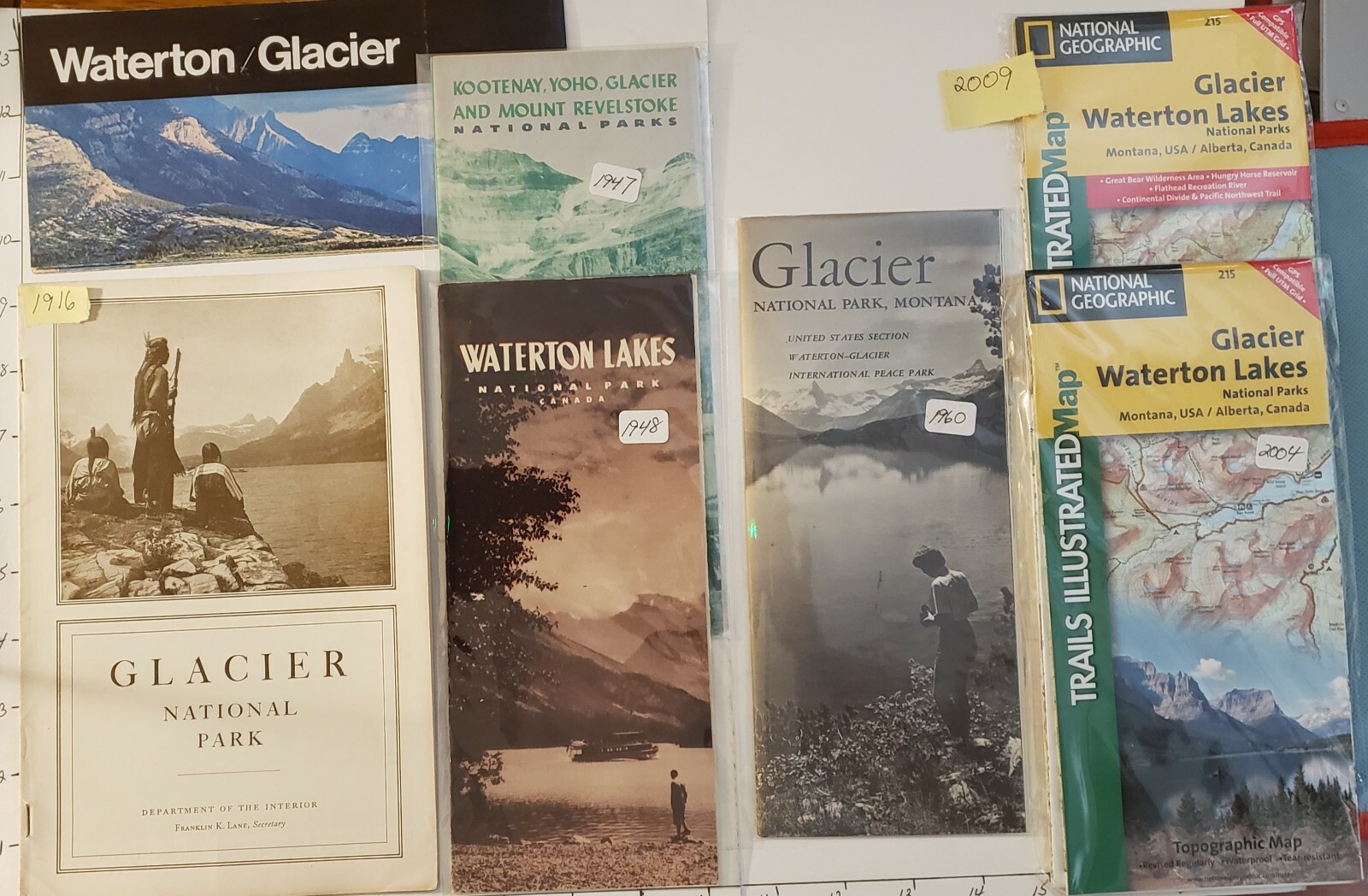 7-GLACIER NAT. PARK MAPS & BROCHURES FROM 1916 TO 2009. SEE DESCRIPTION EX-MINT