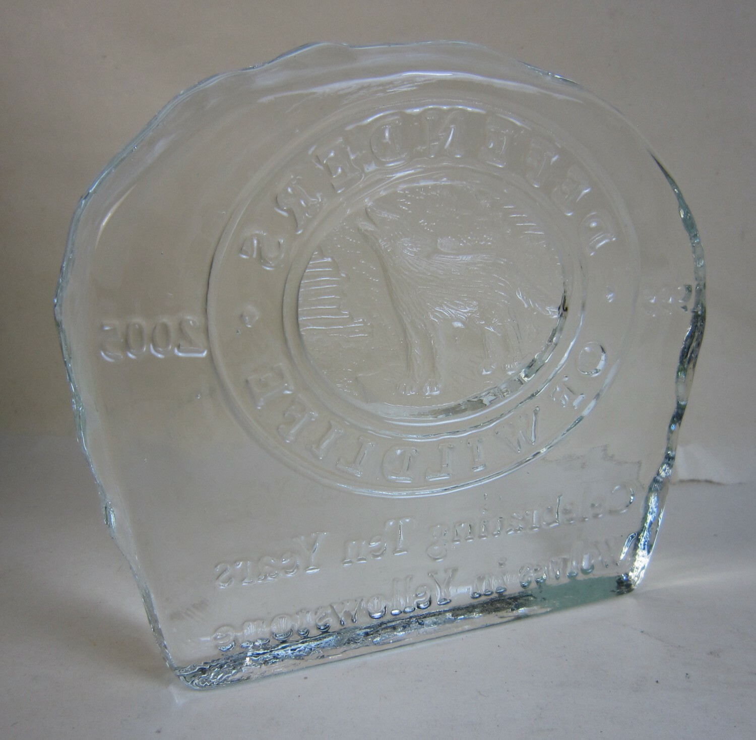 2005 Defenders of Wildlife 10 Years of Wolves in Yellowstone Glass Paperweight