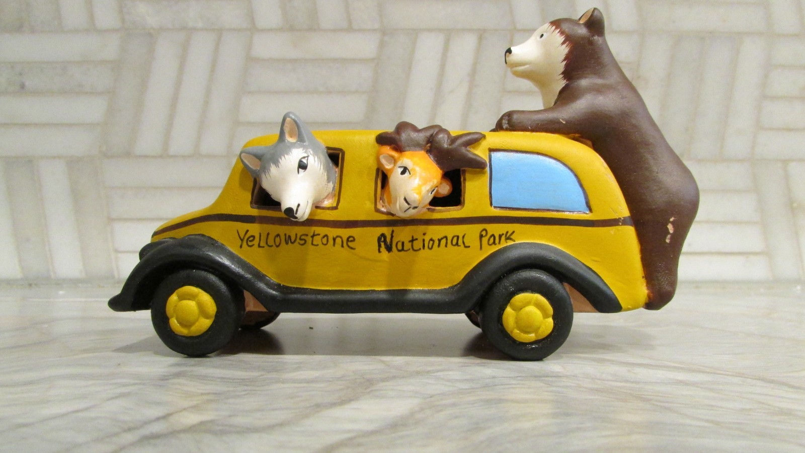 Pottery Yellowstone National Park Souvenir Figurine 5.5″ L Bus w Wolf Bear Deer