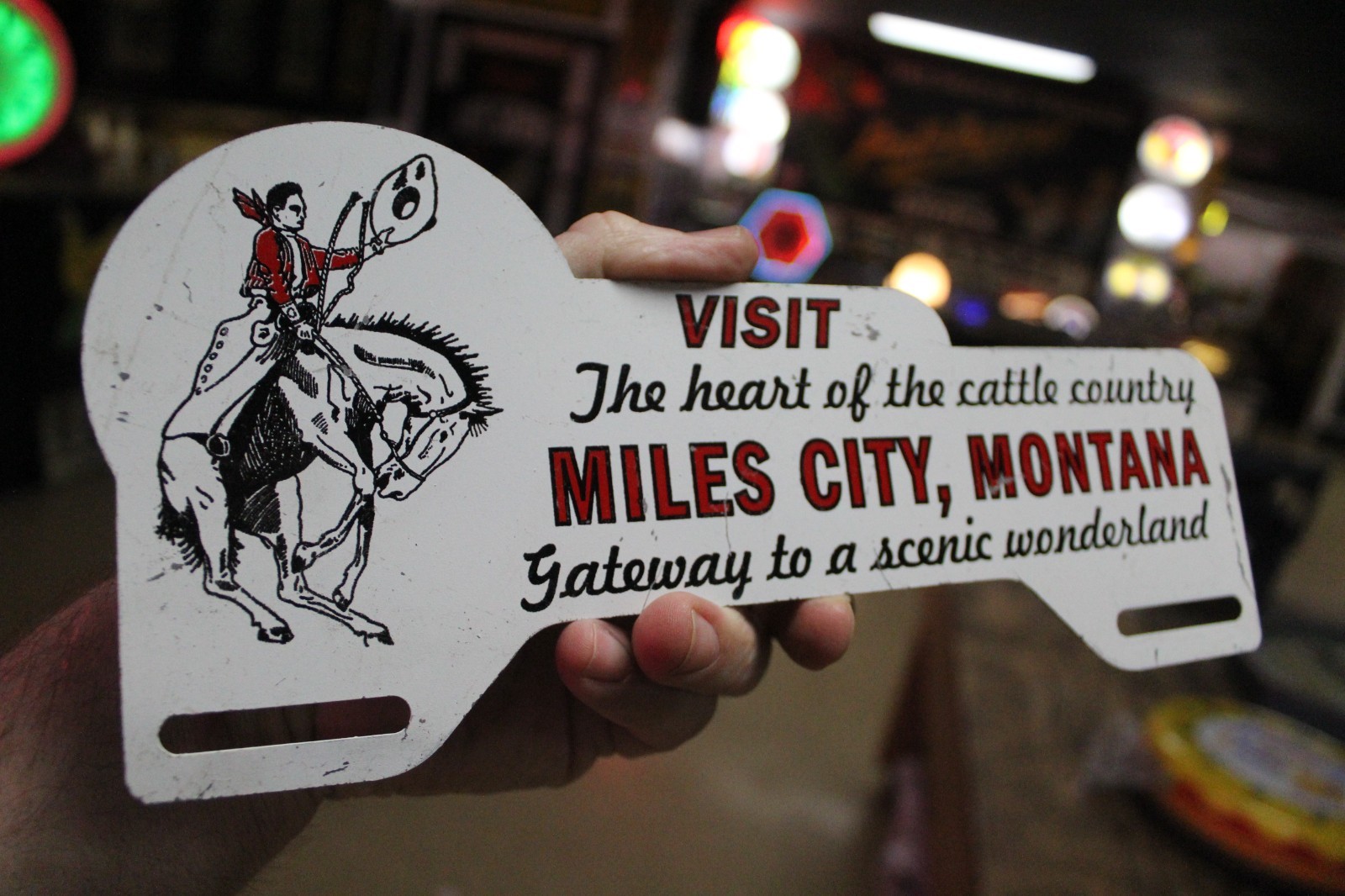 RARE 1950s MILES CITY MONTANA STAMPED PAINTED METAL TOPPER SIGN COWBOY HORSE