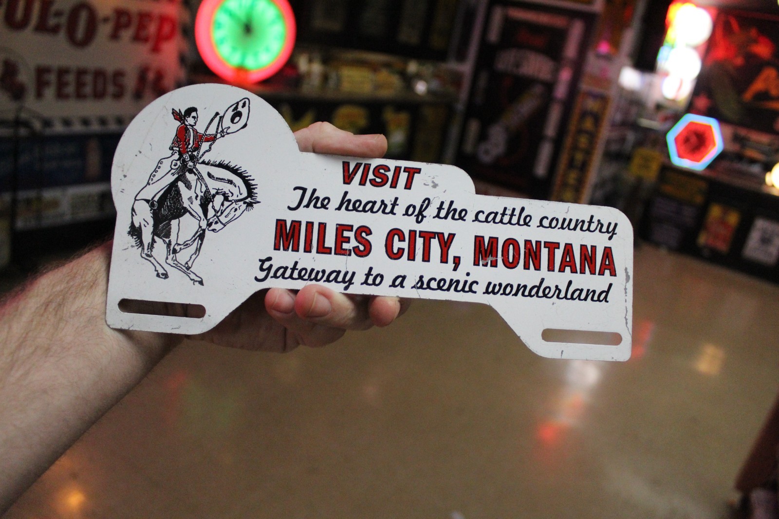 RARE 1950s MILES CITY MONTANA STAMPED PAINTED METAL TOPPER SIGN COWBOY HORSE