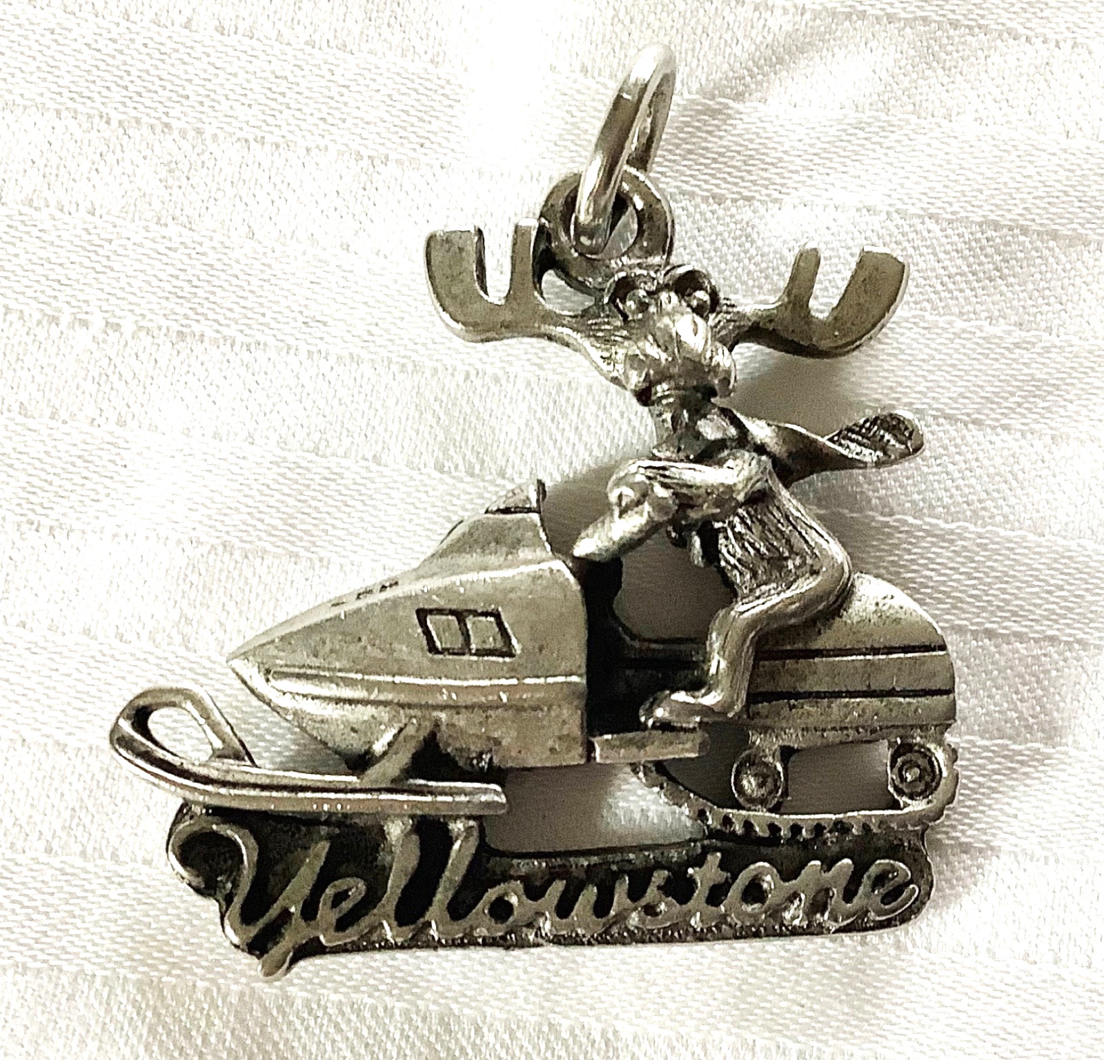Markie Moose on Snowmobile – Yellowstone Park Souvenir Metal Pendant – 1.25″