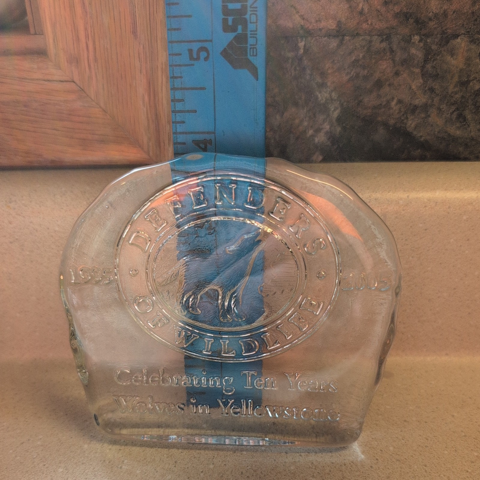 2005 Defenders of Wildlife 10 Years of Wolves in Yellowstone Glass Paperweight