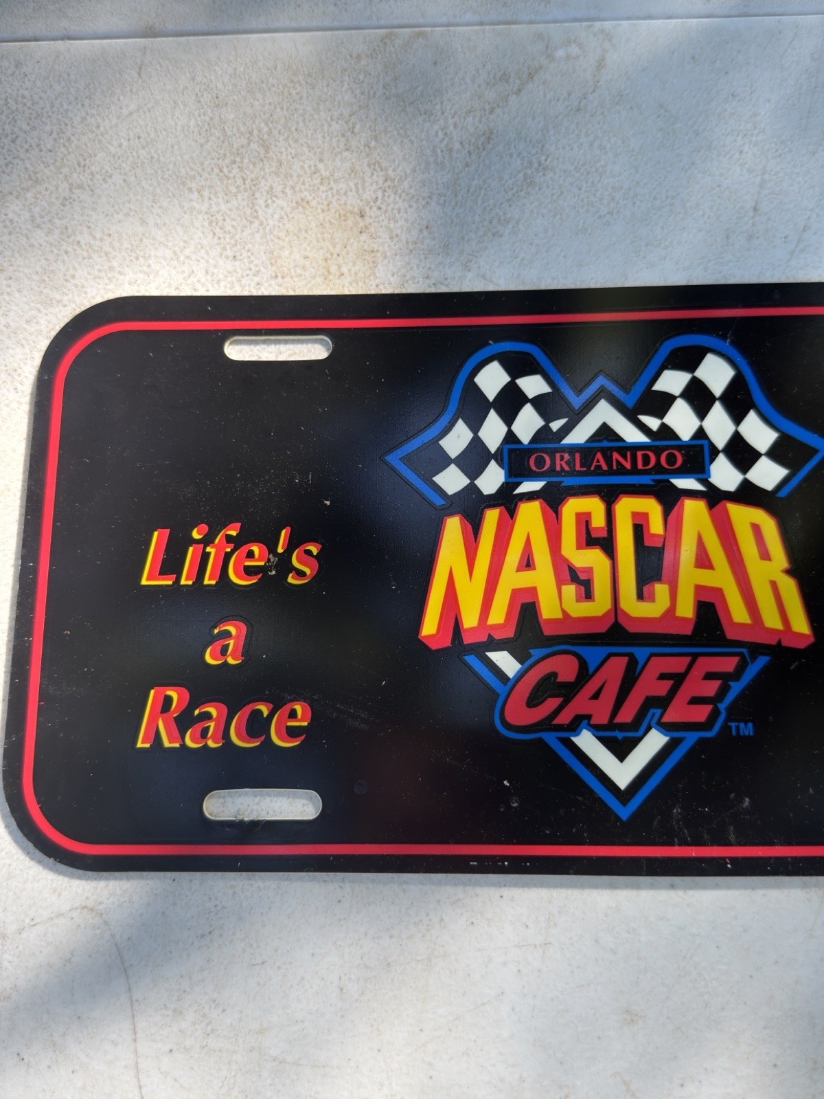 Vintage NASCAR CAFE Smoky Mountains Plastic License Plate Novelty Life’s A Race
