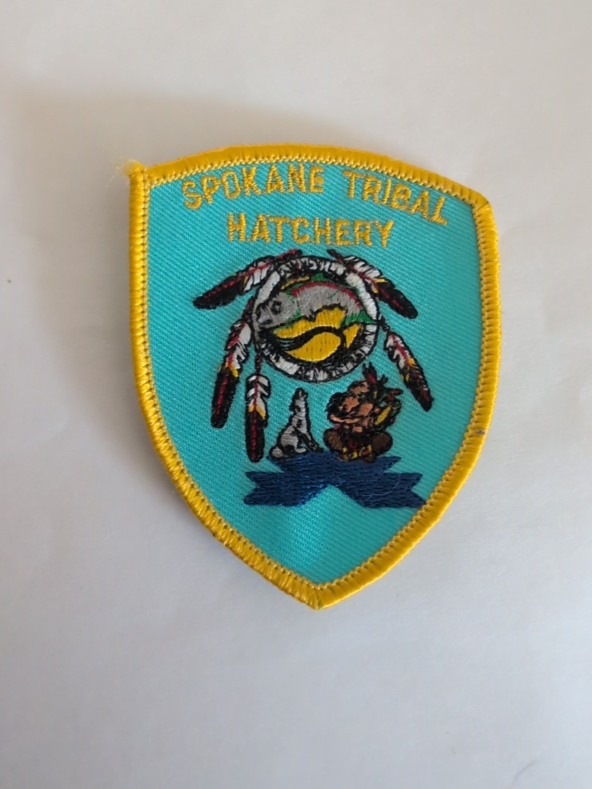Spokane Washington Tribal Hatchery Embroidery Patch Wolf Blue Yellow Feathers