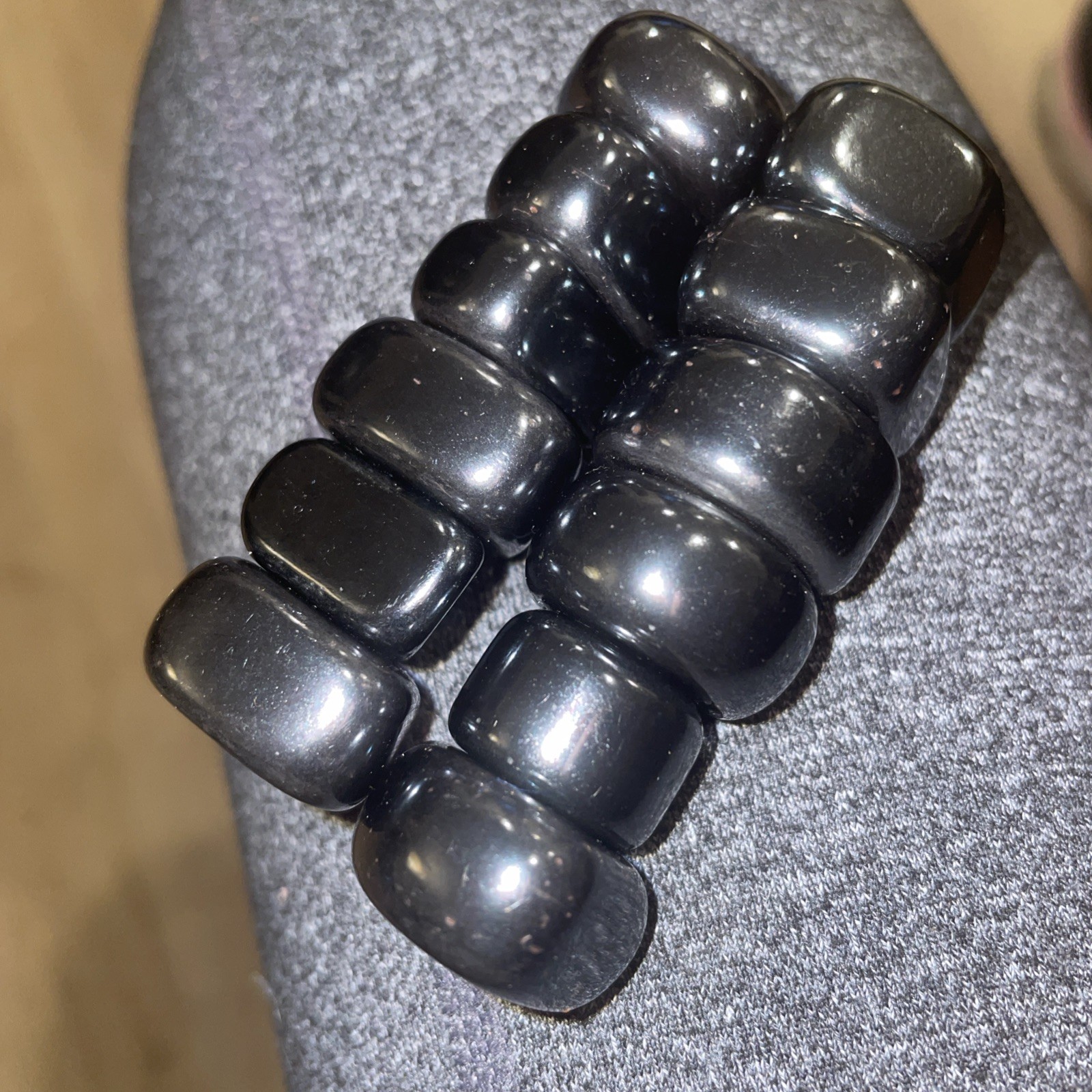 12 Smooth Hematite Magnets In Grand Canyon Suede Bag