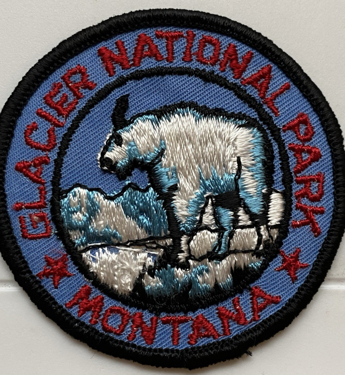 Glacier National Park Montana Mountain Goat Round Blue Embroidered Sew-on Patch