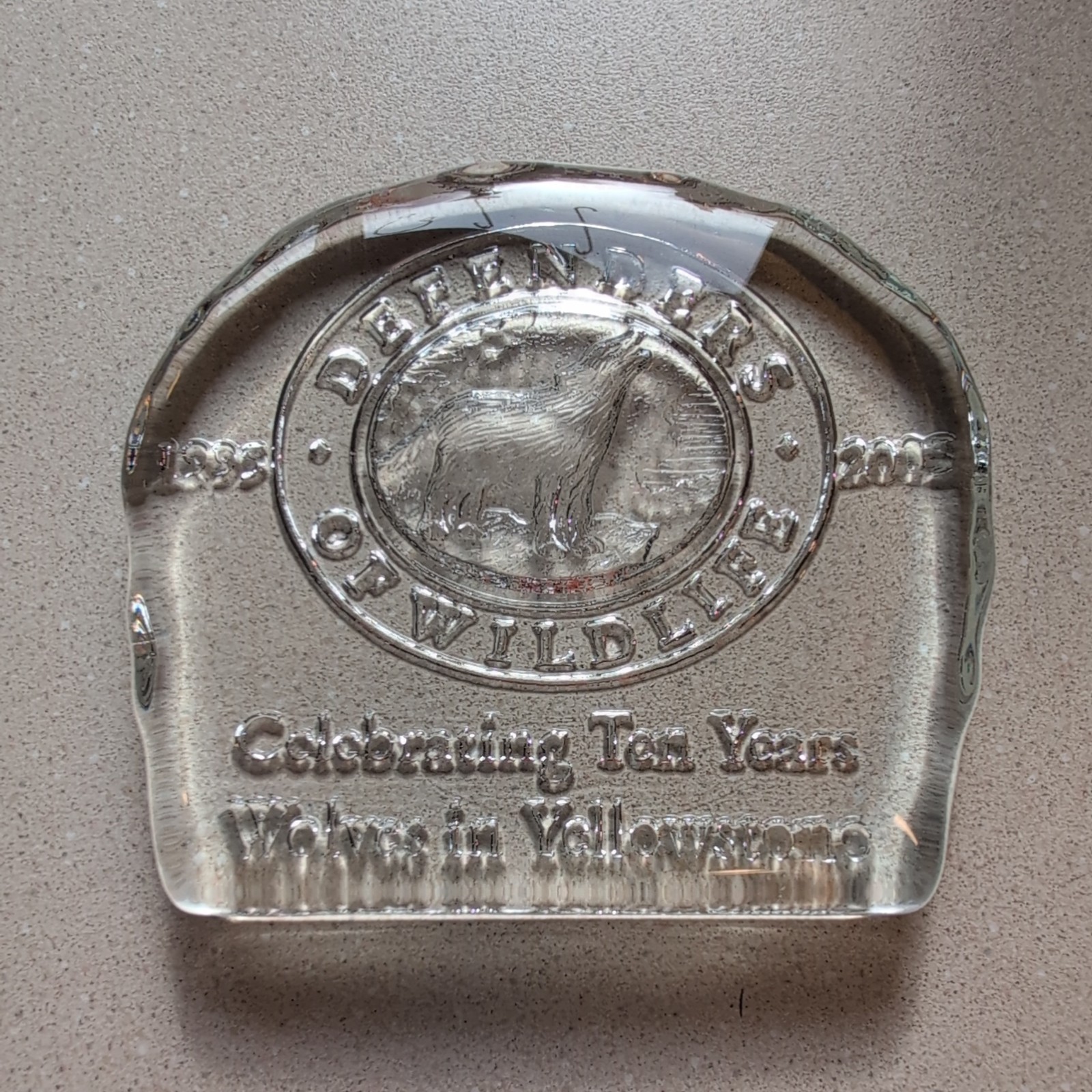 2005 Defenders of Wildlife 10 Years of Wolves in Yellowstone Glass Paperweight