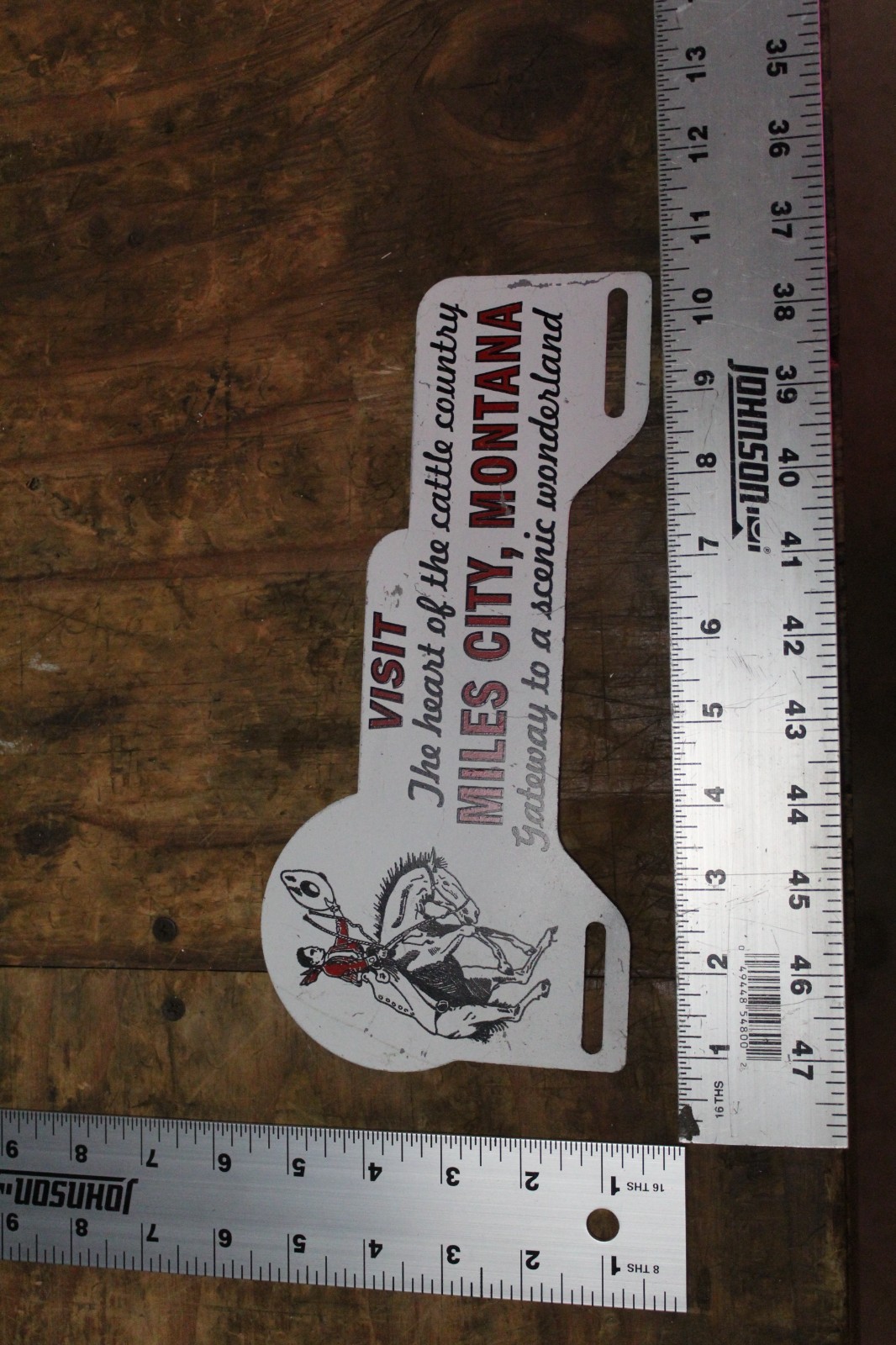 RARE 1950s MILES CITY MONTANA STAMPED PAINTED METAL TOPPER SIGN COWBOY HORSE