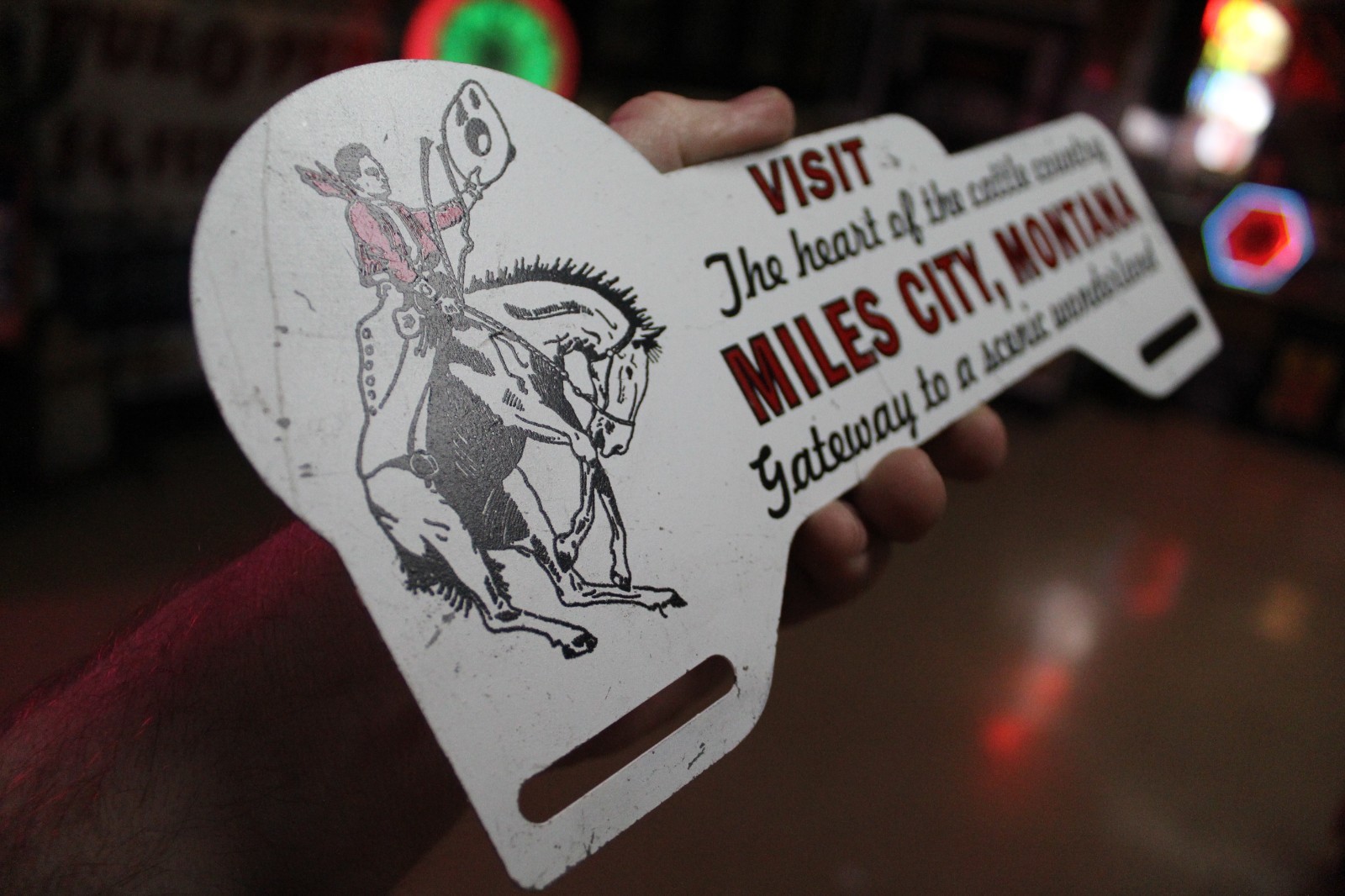RARE 1950s MILES CITY MONTANA STAMPED PAINTED METAL TOPPER SIGN COWBOY HORSE