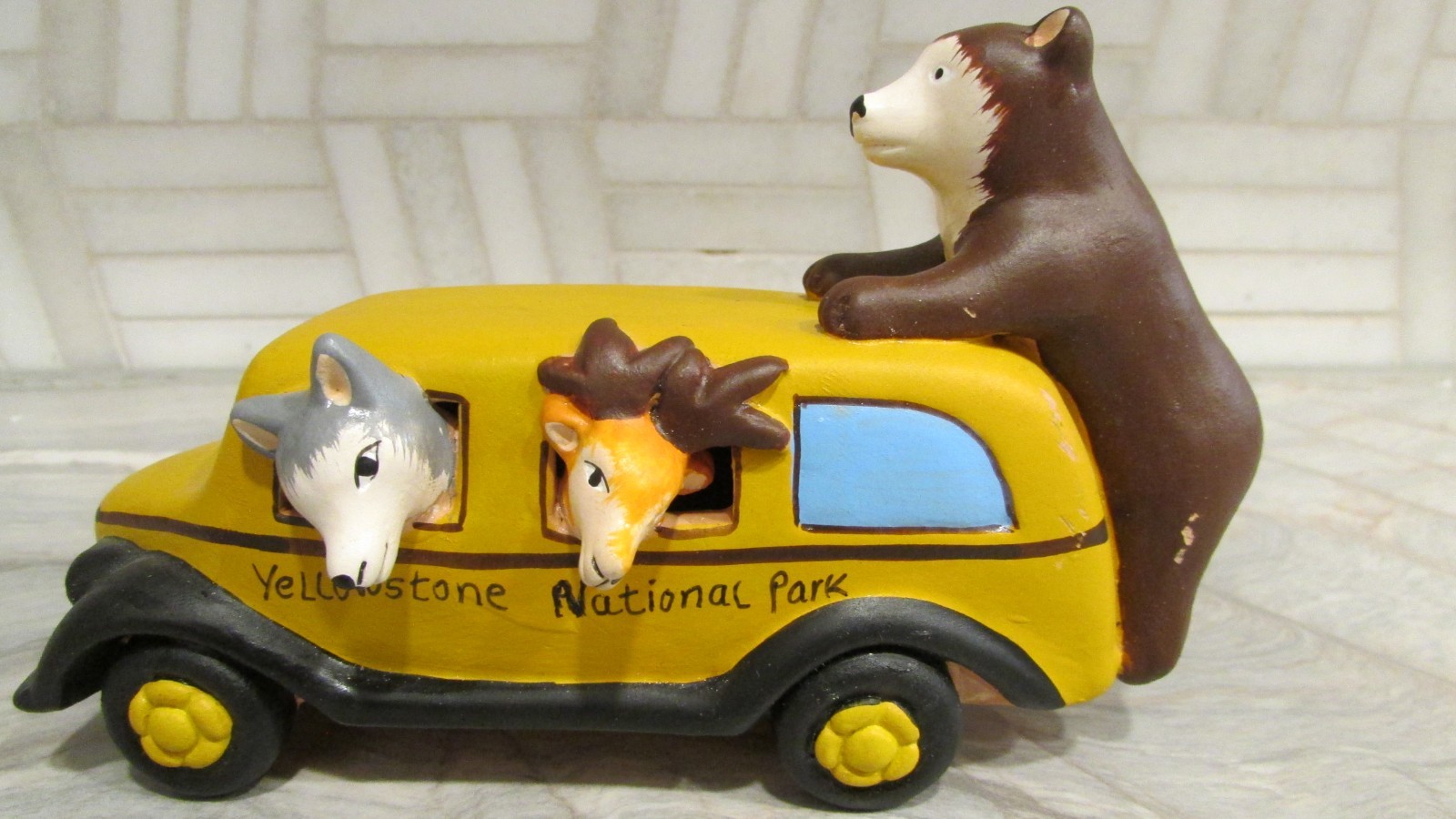 Pottery Yellowstone National Park Souvenir Figurine 5.5″ L Bus w Wolf Bear Deer