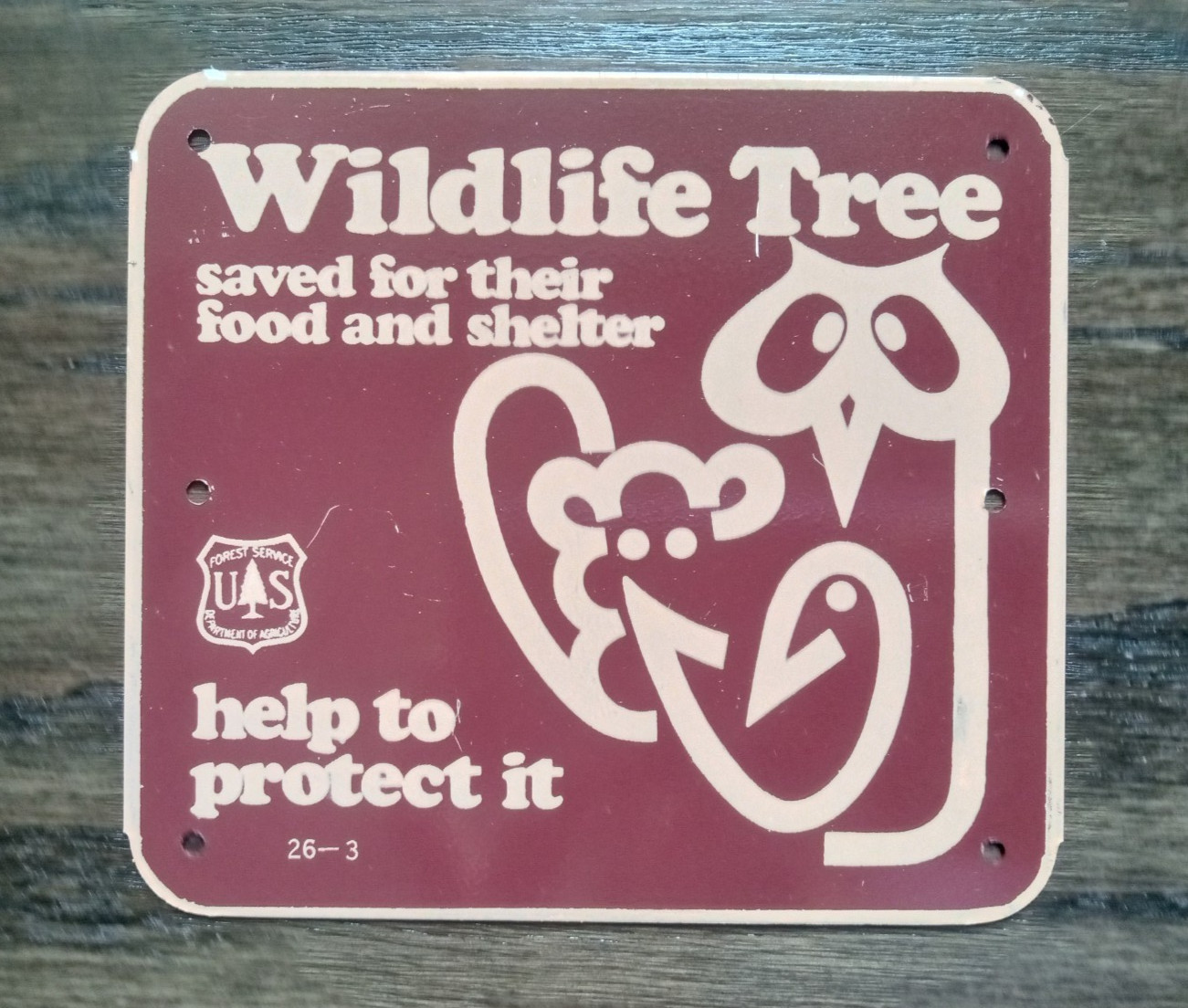 Old Vintage National Forest Service Metal Sign “Wildlife Tree” help protect it